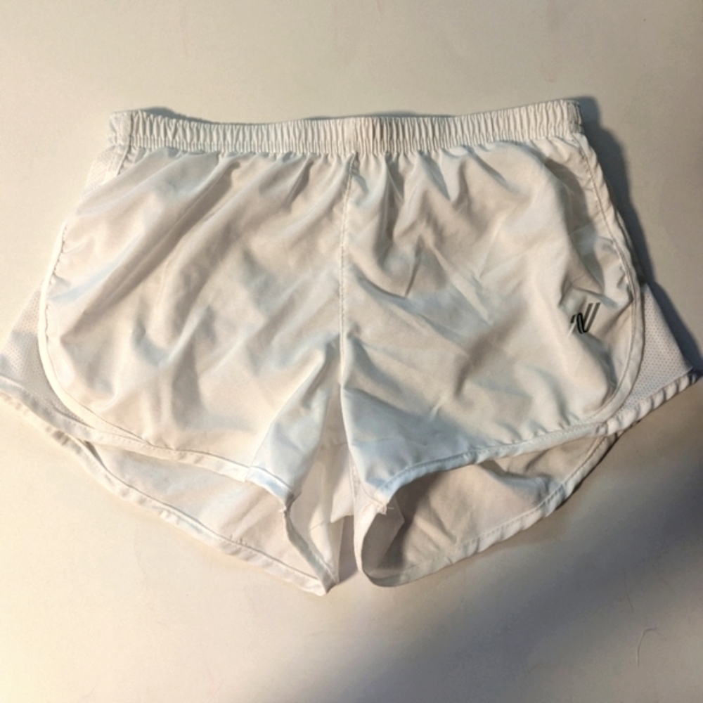 Girls Varsity White Cheer practice shorts, sz YL. Lined. EUC.